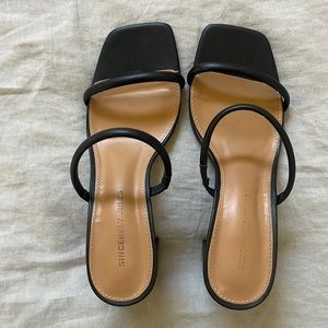 Strappy black heeled sandals